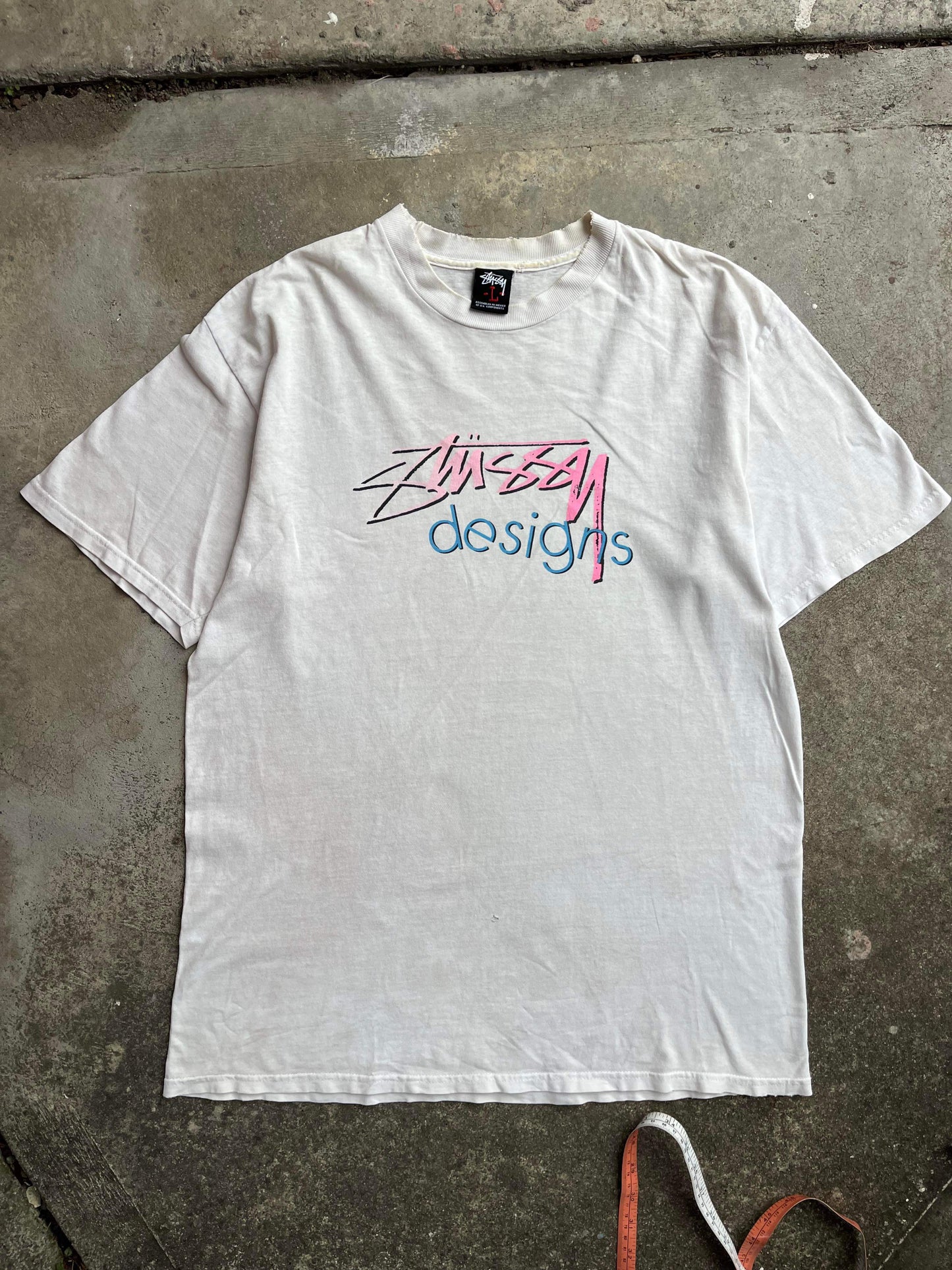 (L/XL) Early 00’s Stussy Designs Tee